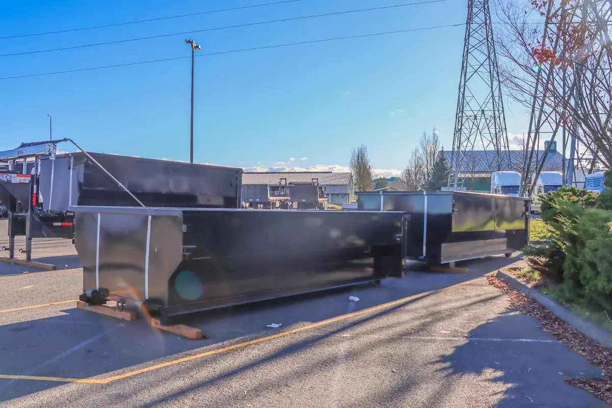 Roll-off dumpster ready for waste disposal at job site for 15 Yard Dumpster Rental in Mundy
